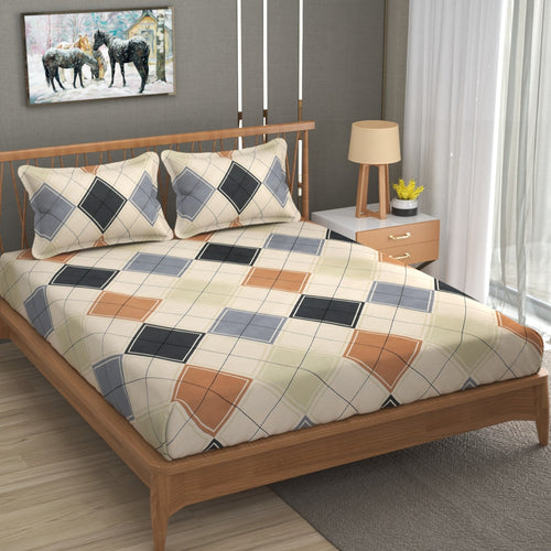 Bed with diamond patterned bedding in a bedroom setting